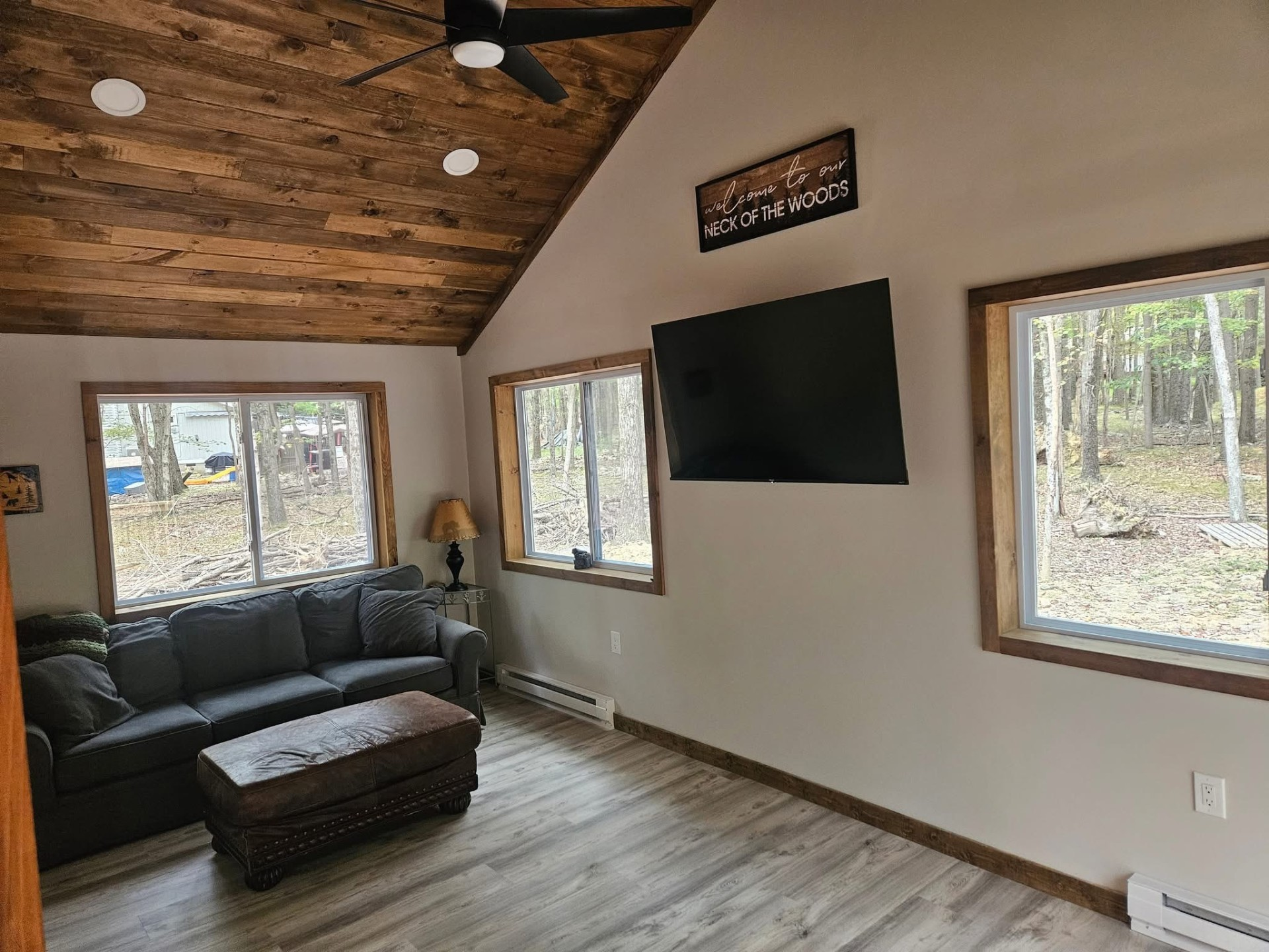 Cabin living room with wood ceiling